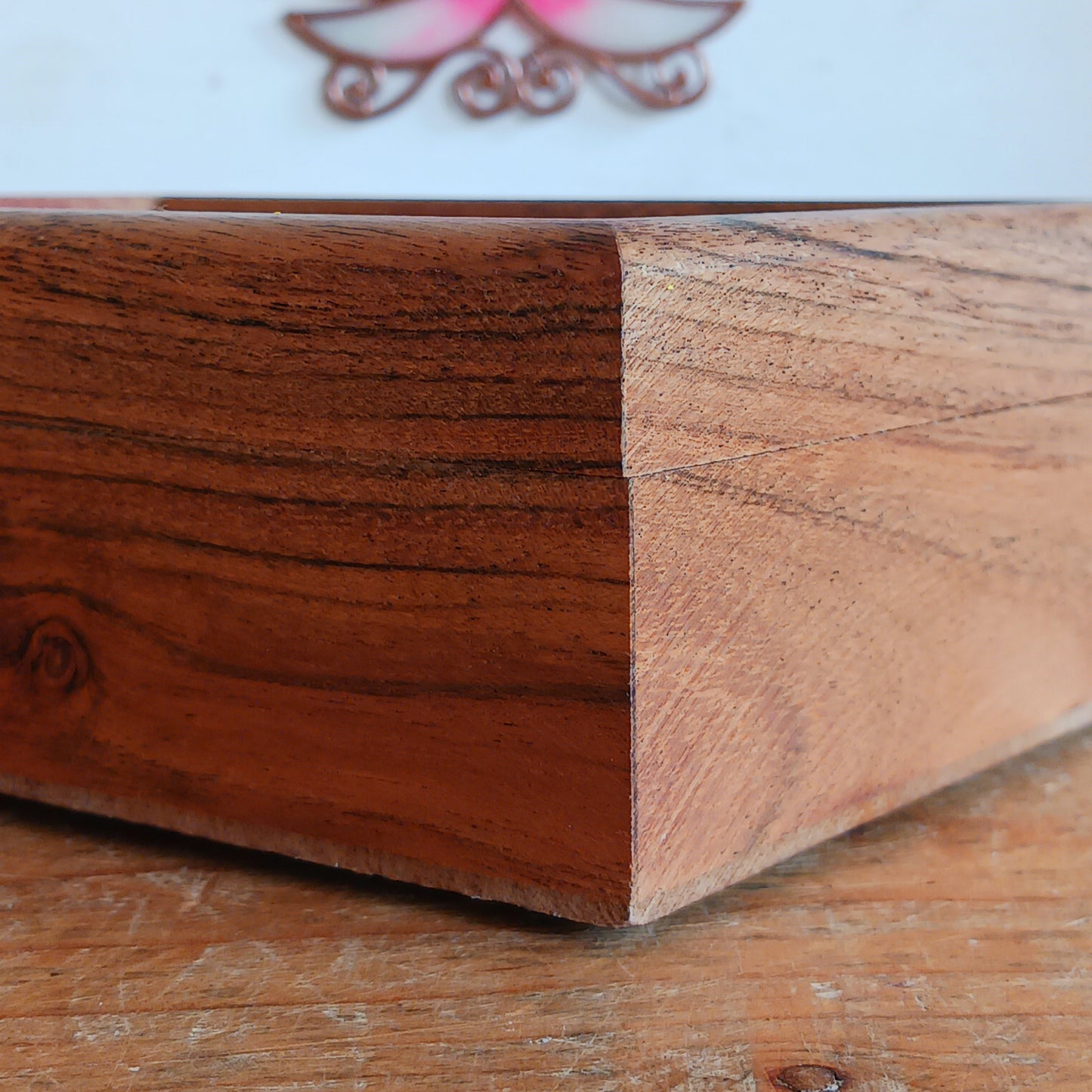 Keep your cherished items safe in this beautifully crafted mango wood jewellery box, engraved with the word ‘Namaste’. A Sanskrit greeting meaning “the divine in me greets the divine in you,” it serves as a daily reminder of connection, presence, and mutual respect. Accented with rose quartz—symbolizing love, compassion, and emotional healing—this box is ideal for storing jewellery, keepsakes, cards, or other personal treasures. Subtle, spiritual, and thoughtful, it’s a meaningful addition to any space.