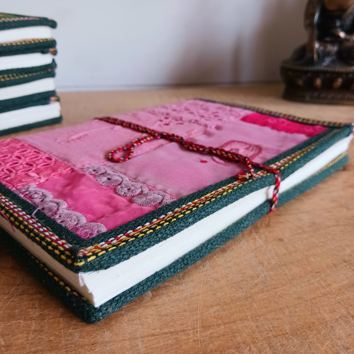 This beautifully bound notebook with handmade paper is from recycled cotton. An imaginative use for sari offcut material, the cover is edged and framed with pretty brocade material to complete a lovely and unique eco friendly stationery gift.