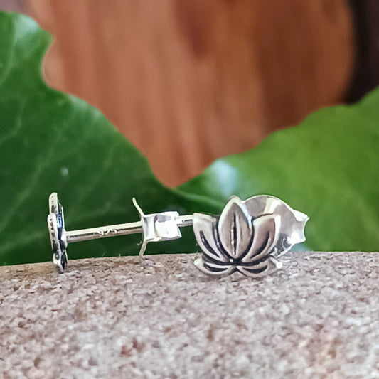Make a subtle yet stylish statement with these beautiful Lotus Flower 925 Sterling Silver Ear Studs. Crafted with care from 925 silver, these graceful earrings add a touch of sophistication to any look.