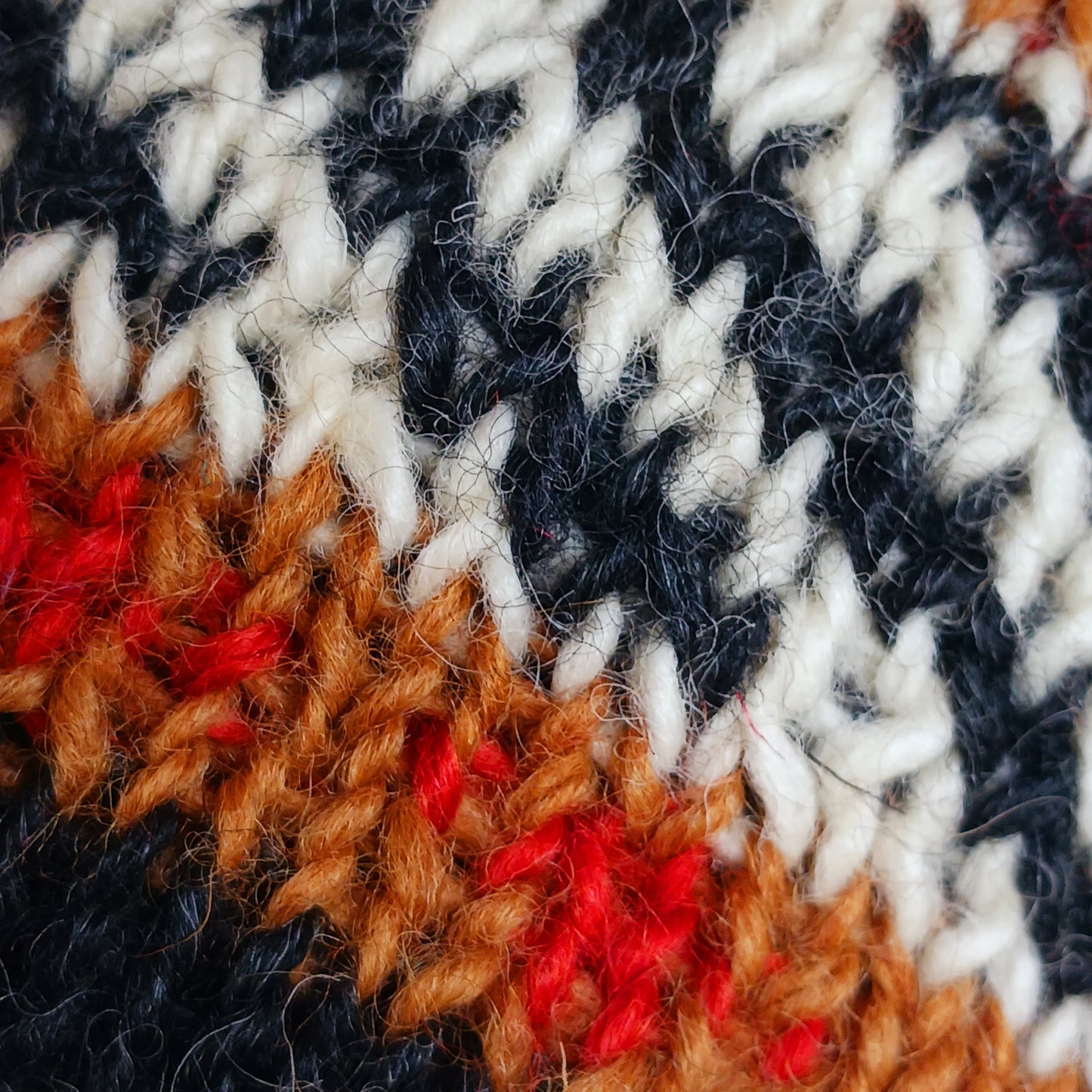 Stay cozy and stylish with our handmade chunky wool earflap hats, crafted in Nepal by skilled women artisans in Kathmandu. Each hat is 100% pure wool and features a soft polar fleece lining for extra warmth and comfort. Perfect for cold winter days, outdoor adventures, or adding a touch of handmade charm to your look.