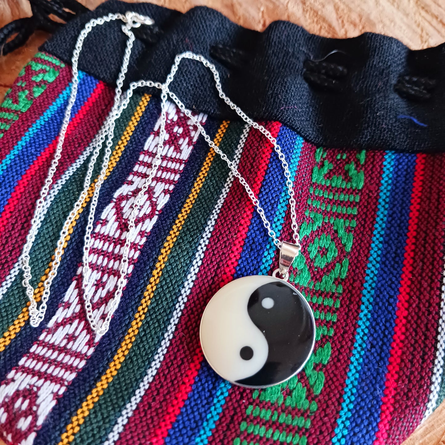 This sterling silver Yin Yang pendant on a silver chain is intended to balance the mind. Handcrafted for durability and designed to last a lifetime.