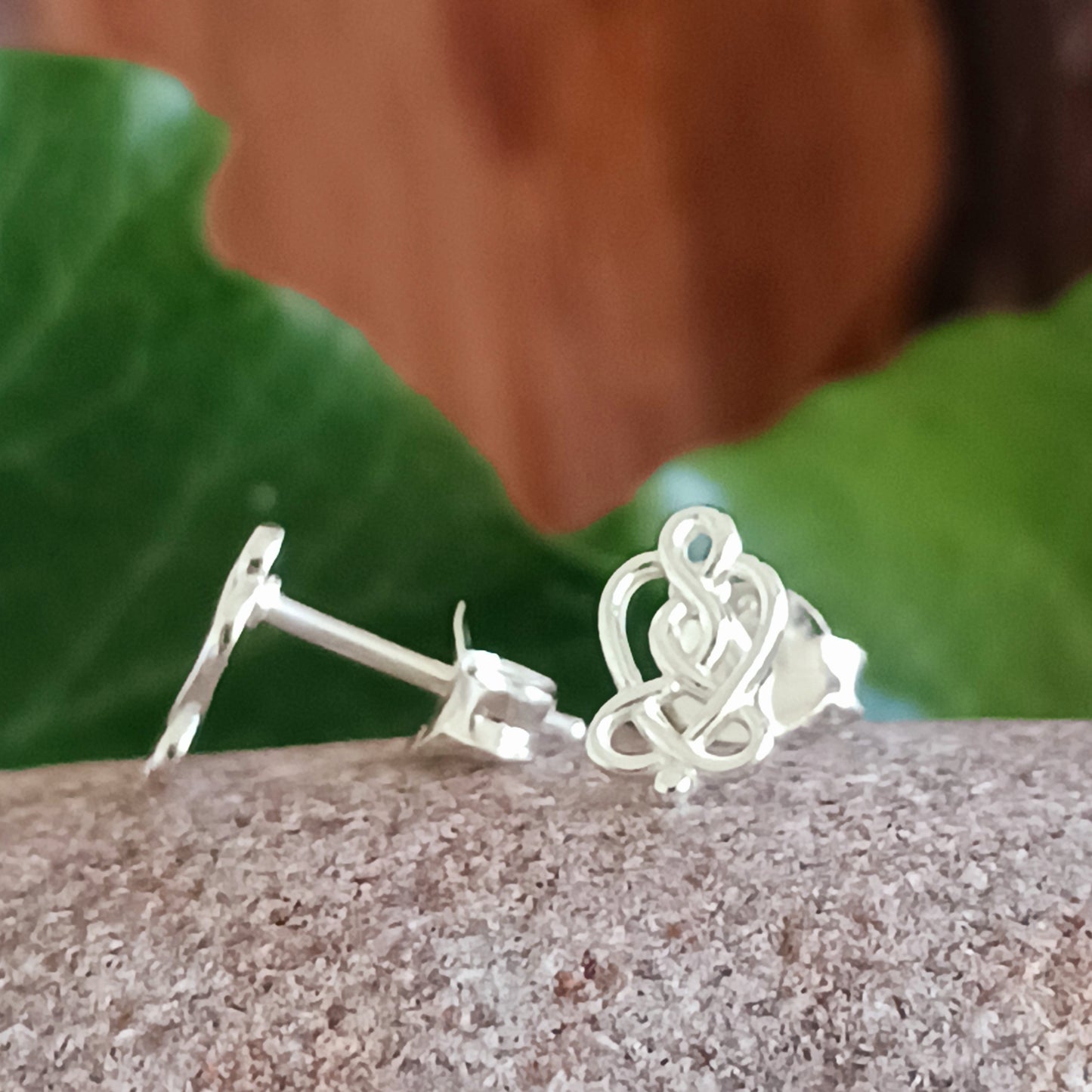 Beautifully crafted 925 sterling silver Celtic stud earrings, featuring ancient Celtic symbol artwork translated into intricate jewellery. A timeless piece, rich in history and symbolic meaning.