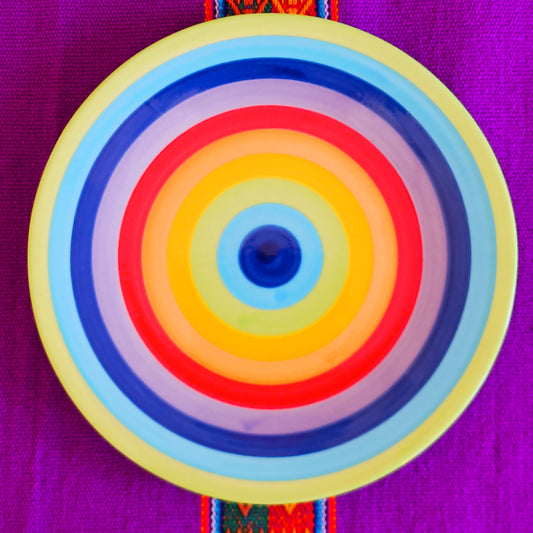 These wonderfully cheerful, rainbow stripe side plates brighten up any meal. The vibrant stripes are hand painted giving each piece individual character.