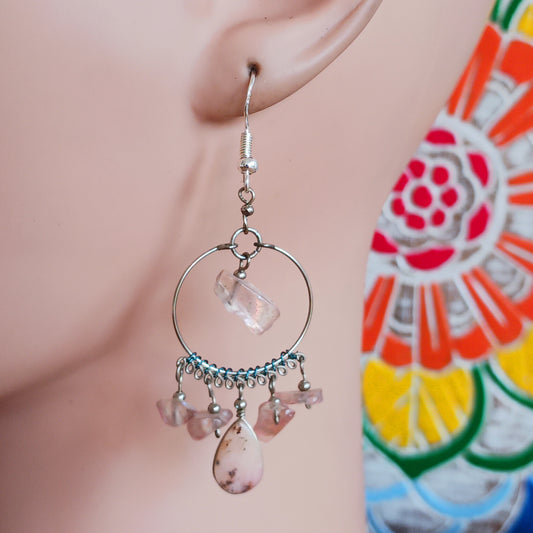 Add a touch of bohemian beauty to your look with these handmade Peruvian stone earrings. Featuring rose quartz stones and finished with silver-plated hooks, each pair is carefully crafted in small workshops in Peru.