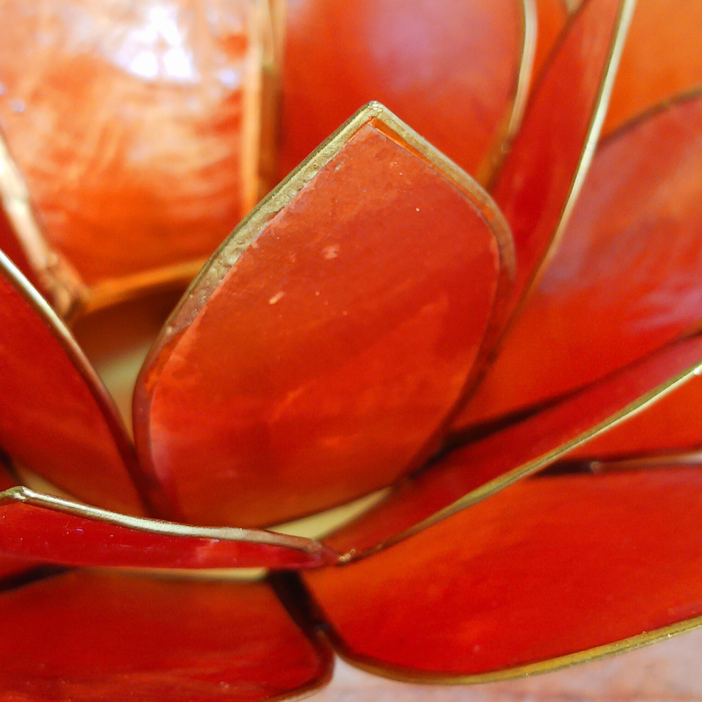 The Lotus Flower is a symbol of achieving enlightenment, peacefulness and spirituality. This beautiful candle holder can be fitted with tealight candles or slightly larger candles. The diameter of the middle is roughly 5.5cm, so it will fit any candle with the same diameter.