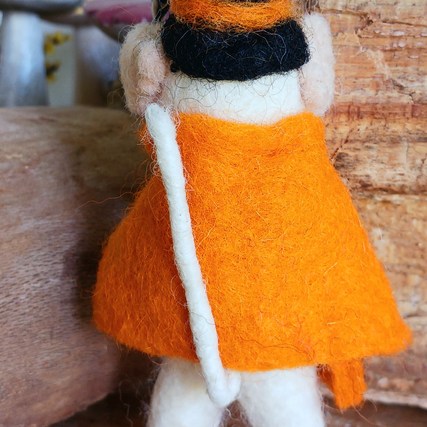 Bring a touch of handcrafted Halloween charm to your home with these delightful felted mice dressed as a playful “Boo” character. Each mouse features adorable details including long tails, soft pink ears and noses, and colourful pointed hats and capes. These little mice have a “Boo” sign—and comes with a black-and-white hanging thread, perfect for decorating branches, hooks, garlands, or spooky seasonal displays.
