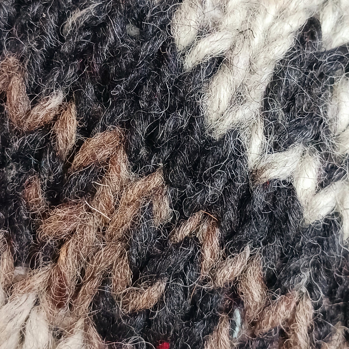 Stay cozy and stylish with our handmade chunky wool earflap hats, crafted in Nepal by skilled women artisans in Kathmandu. Each hat is 100% pure wool and features a soft polar fleece lining for extra warmth and comfort. Perfect for cold winter days, outdoor adventures, or adding a touch of handmade charm to your look.