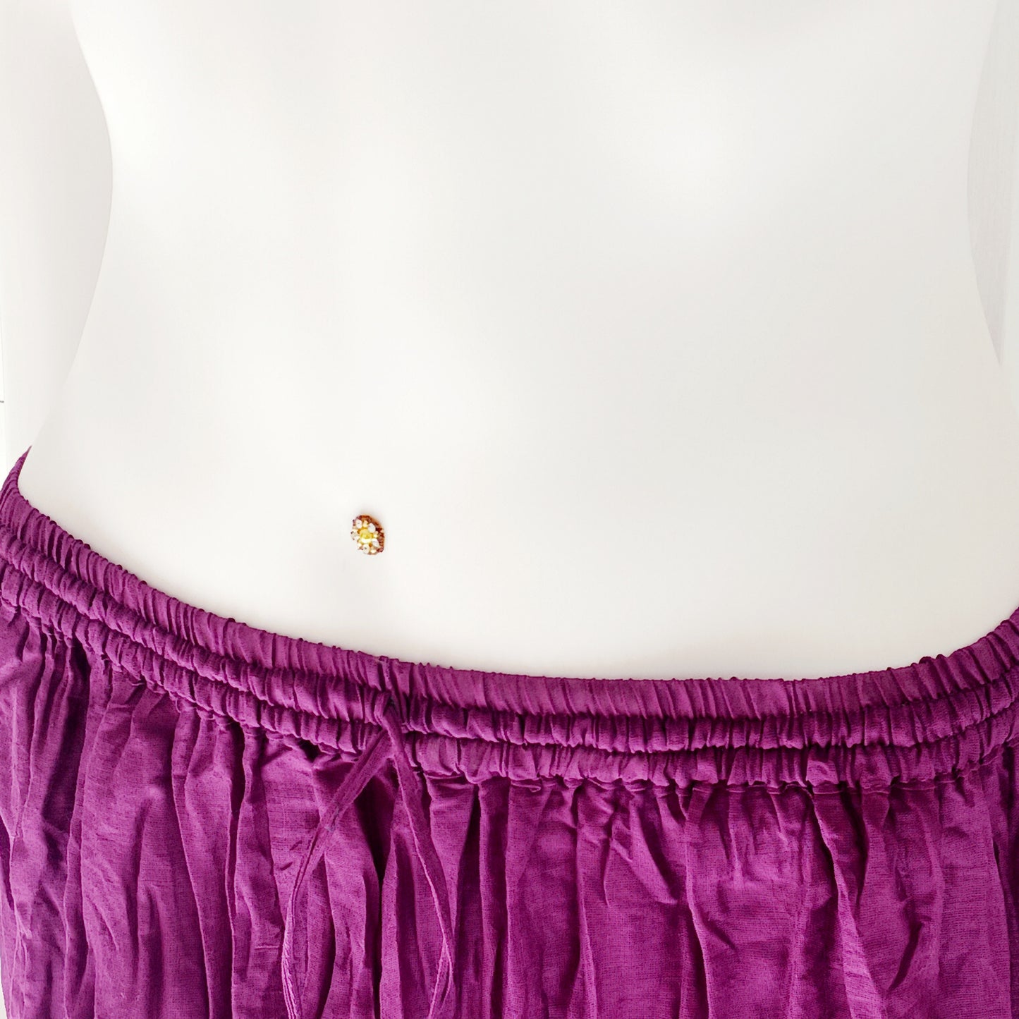 This beautiful Indian crinkle skirt is lovely and light so you can move with ease and comfort on a sunny day or a hot night. Made from rayon crepe, you can’t go wrong with this lovely skirt, it will add to your flowing summer style. And as rayon is quick drying, it also makes this a great beach cover up skirt.