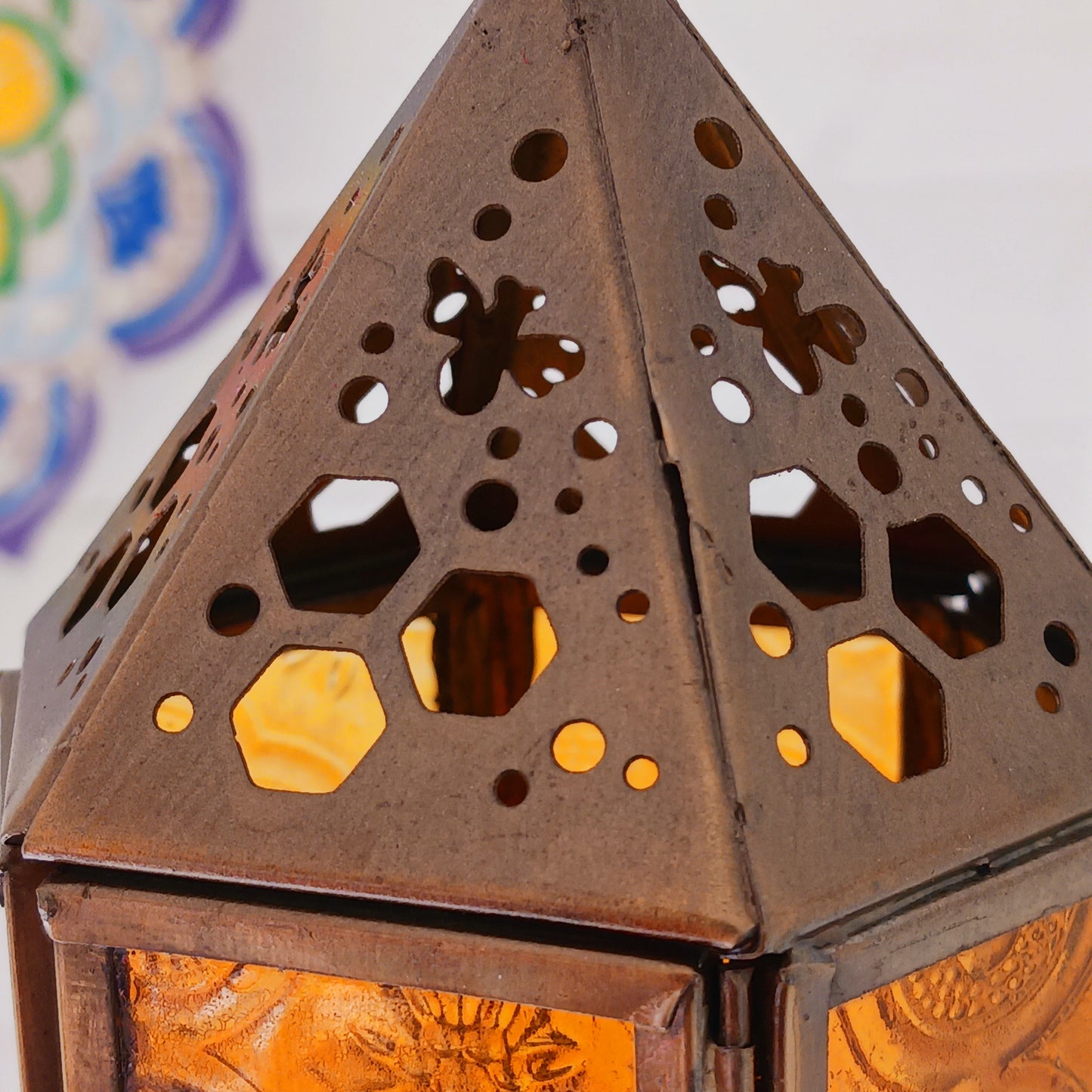 This cute little tealight lantern has honeycomb and bee cut outs crafted into the antique brass coloured metal. Open the small hinged door to add a tealight and close with the sliding latch. A super gift idea for gardeners and nature lovers. Ideal as indoor table centrepieces and summer table decorations for garden parties and eating alfresco. Light to provide a comforting indoor glow on darker days.
