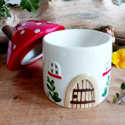 This charming mushroom house oil burner makes both a practical and eye-catching decor piece for fragrancing the home. Simply place fragrance oil diluted with water or a wax melt under the toadstool lid and light a standard tealight underneath to enjoy the calming scent.
