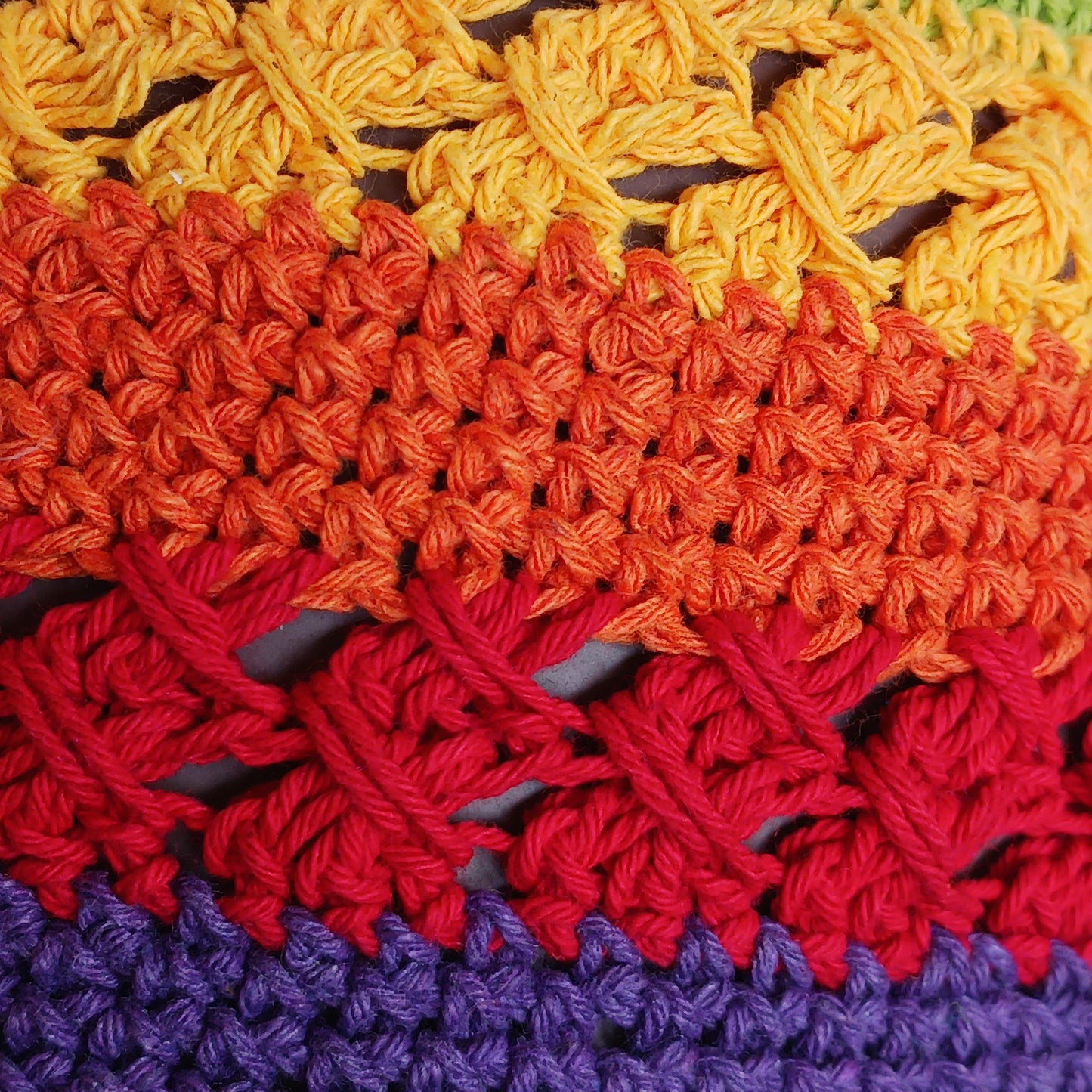 Brighten up your summer with this vibrant handmade crochet cotton sun hat! Featuring a stunning rainbow pattern, this unique hat is perfect for holidays, beach days, and festivals. A malleable wire is carefully woven into the rim, allowing you to shape the brim just how you like it. Lightweight and breathable, it's ideal for sunny adventures. Each hat is individually handcrafted, so you’ll receive the exact one pictured – a one-of-a-kind accessory to celebrate the season in style.