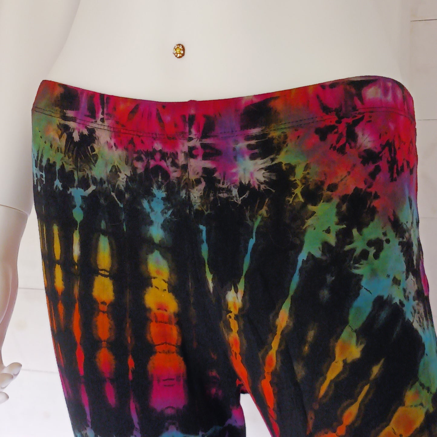 Get your groove on with these funky tie dye bell bottom leggings. They’re super comfy and stretchy and that little bit of a stretch in the fabric means they hold their shape so always look stunning. From yoga poses to festival adventures and dance performances, these leggings provide a versatile fashion choice if you’re seeking both comfort and flair.