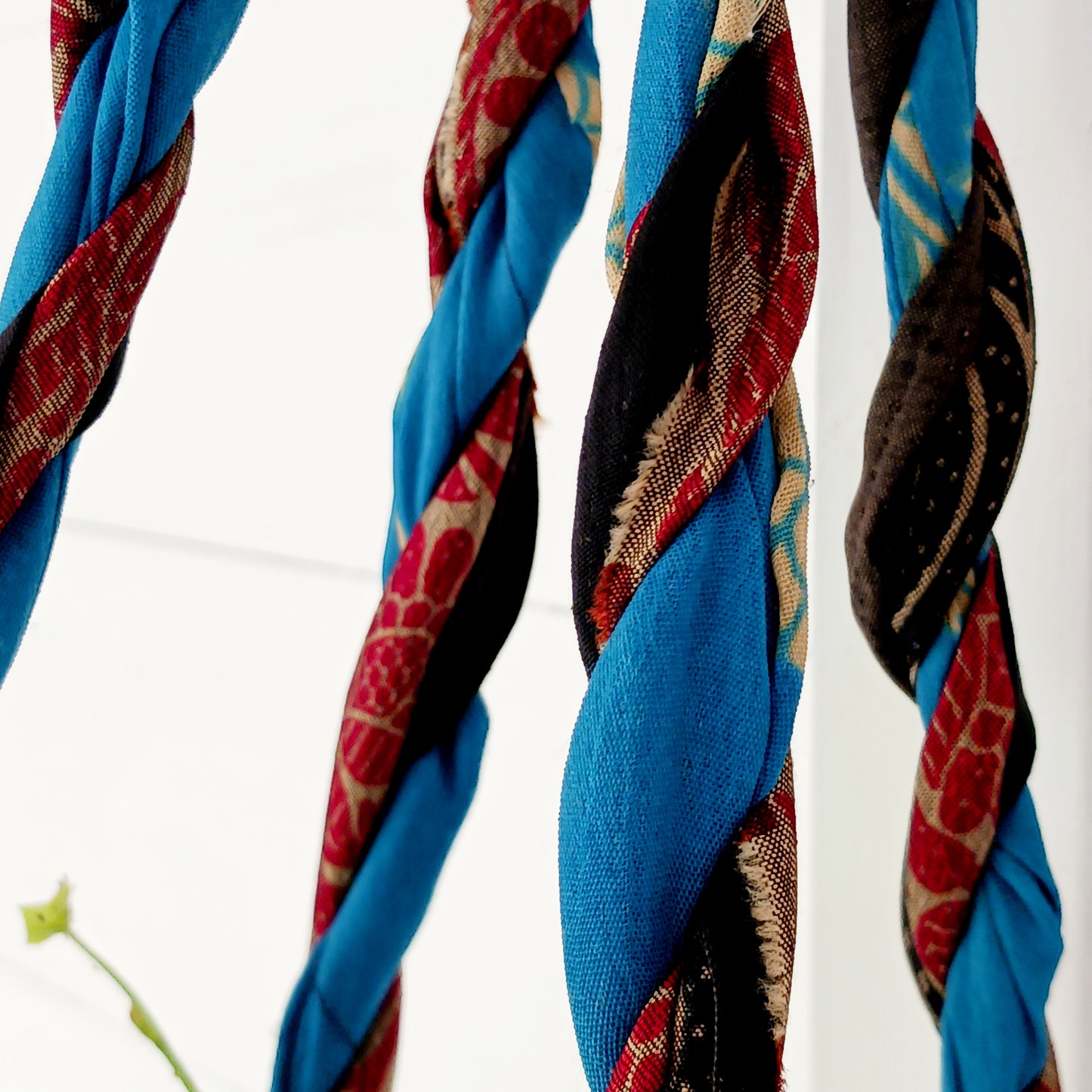 These beautiful sari plant hangers will add a splash of colour and boho chic to your home. Made from scraps of used sari, their simple design ensures that no fabric is wasted but is re-purposed into an elegant product.
