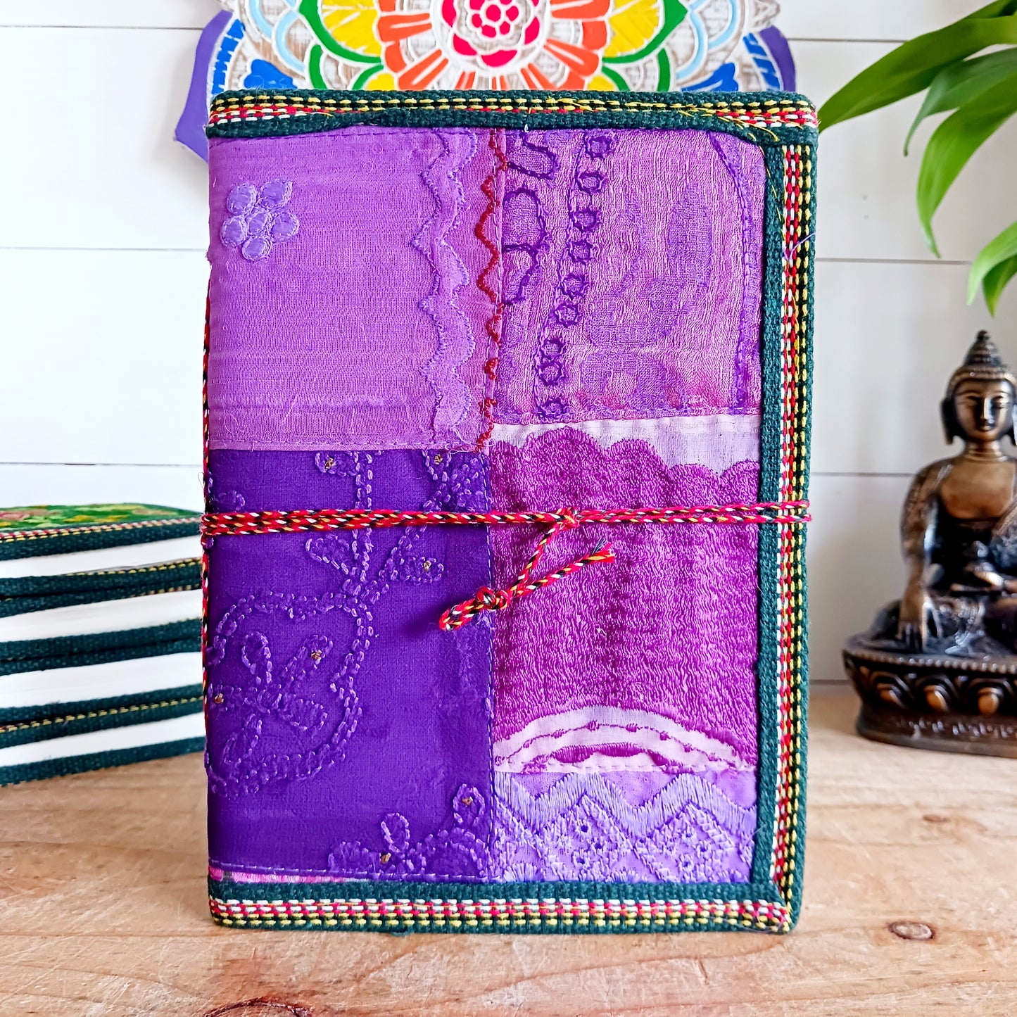 This beautifully bound notebook with handmade paper is from recycled cotton. An imaginative use for sari offcut material, the cover is edged and framed with pretty brocade material to complete a lovely and unique eco friendly stationery gift.