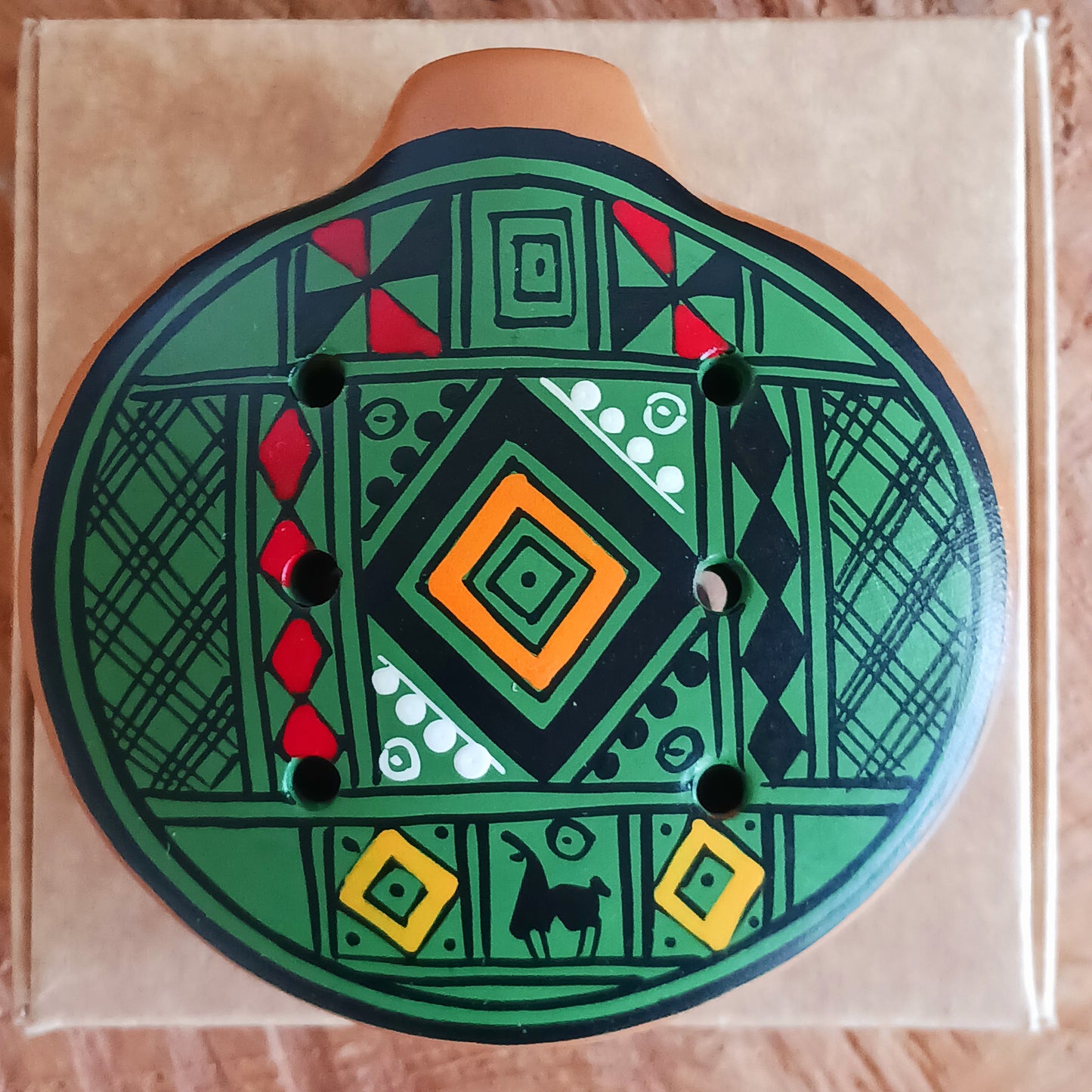 Experience the timeless sound of ancient cultures with these gorgeous ocarinas, handcrafted from fired clay in Peru. Adorned with vibrant, traditional designs, they are a favourite among musicians.