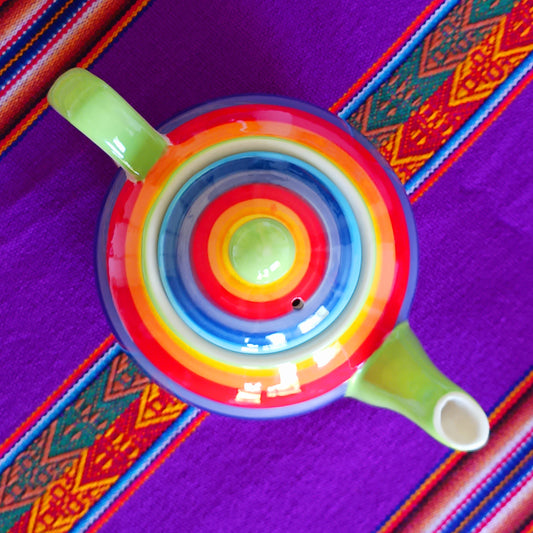 Experience the perfect fusion of artistry and functionality with this exquisite 2-cup ceramic teapot from Thailand. Handcrafted by skilled artisans, this vibrant teapot features a stunning rainbow stripe, adding a pop of colour and charm to your tea rituals.