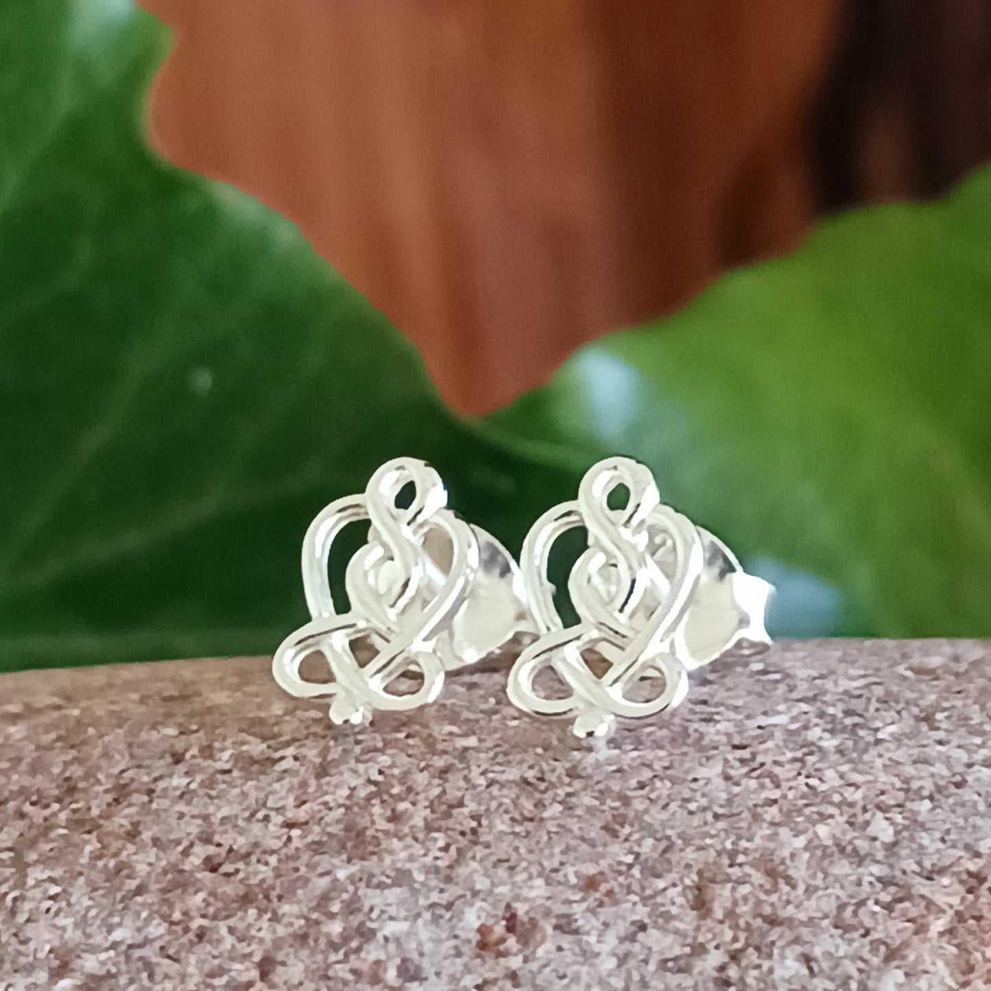 Beautifully crafted 925 sterling silver Celtic stud earrings, featuring ancient Celtic symbol artwork translated into intricate jewellery. A timeless piece, rich in history and symbolic meaning.
