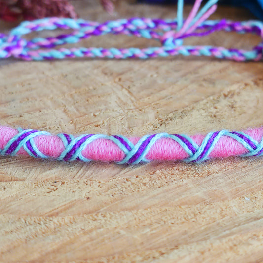 Add meaning and colour to your everyday style with these beautifully handcrafted Thai friendship bracelets. Featuring vibrant crisscross woven designs, each bracelet is a symbol of connection, kindness, and heartfelt wishes.