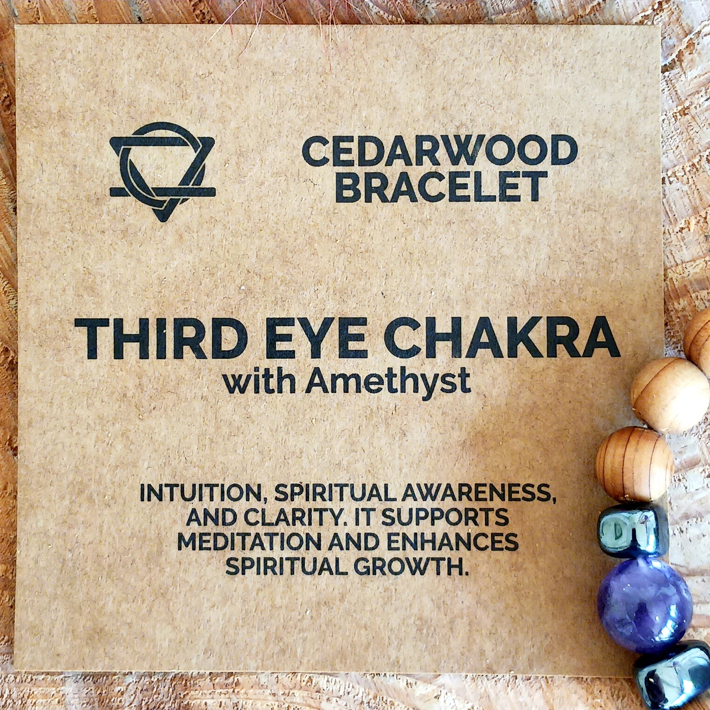 Embark on a journey of inner growth, intuition, and spiritual clarity with the Cedarwood Third Eye Chakra Bangle featuring Amethyst. This enchanting bracelet combines the grounding energy of natural cedarwood with the transcendent vibration of amethyst, a stone renowned for awakening the Third Eye Chakra and enhancing spiritual awareness.