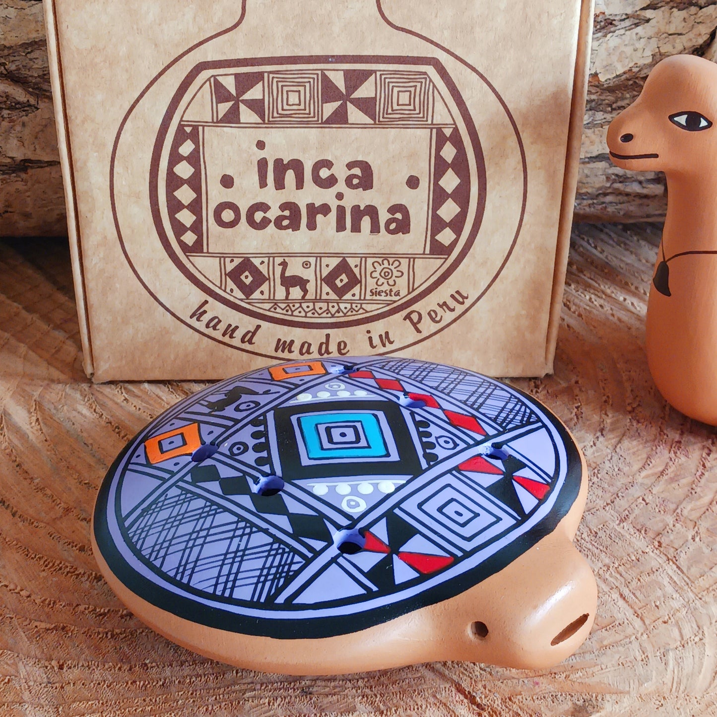 Experience the timeless sound of ancient cultures with these gorgeous ocarinas, handcrafted from fired clay in Peru. Adorned with vibrant, traditional designs, they are a favourite among musicians.