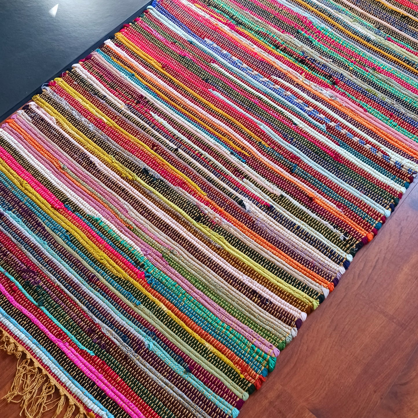 These Indian rugs are hand made from cotton and recycled materials from the Indian textile industry, so they're very eco friendly and great value. They can be used in any room and will bring instant comfort and style to your home.