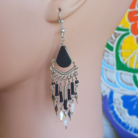 These beautiful earrings incorporate Black Tourmaline Stone with Silver plated hooks. They have been hand made in Peru and are presented in a traditionally made pouch, gift wrapped and ready to give☸