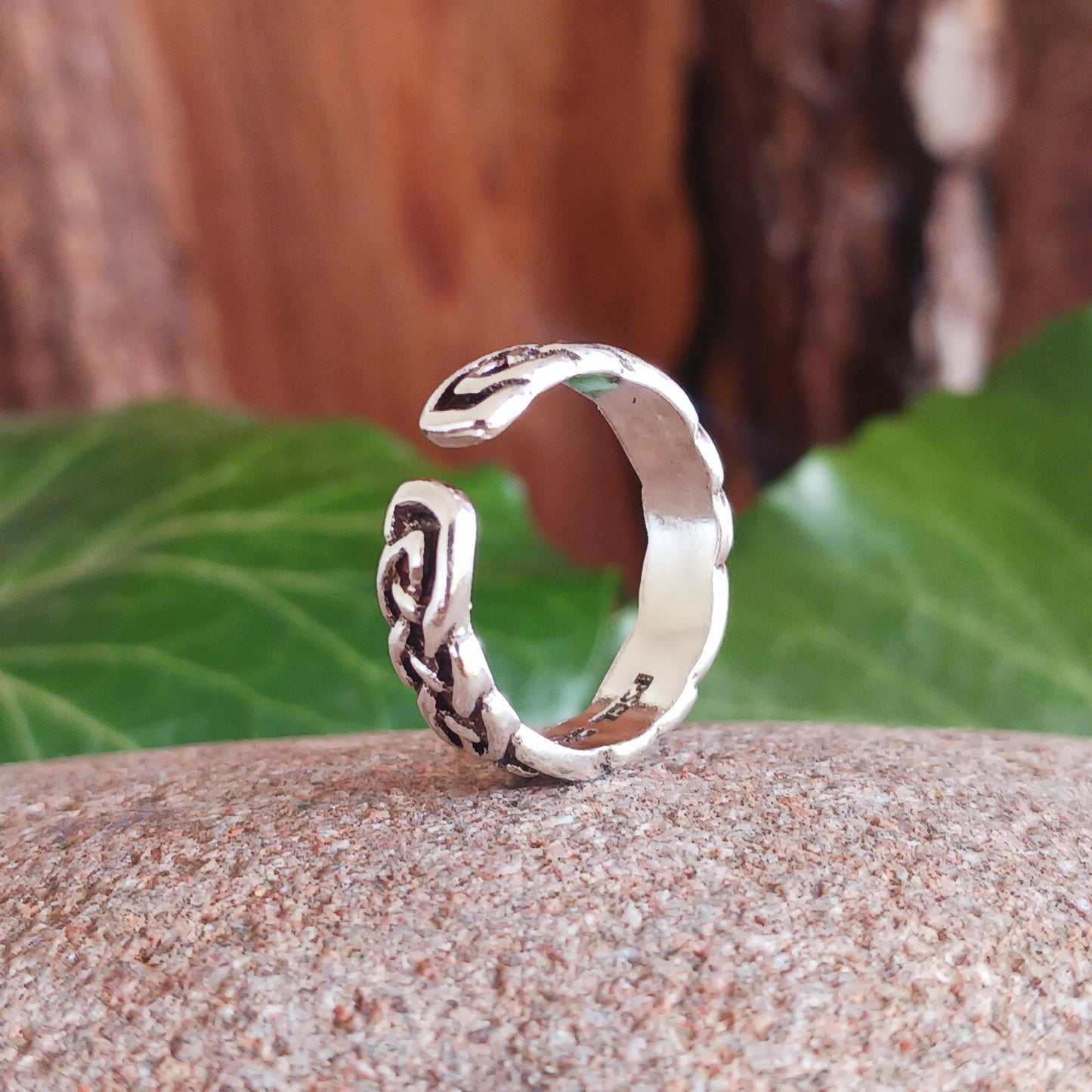 Featuring a woven Celtic pattern with subtle darkening which gives the design depth and presence. This toe ring is adjustable, and comes gifted in a recycled sari ring pouch, ready to give, or keep for yourself.