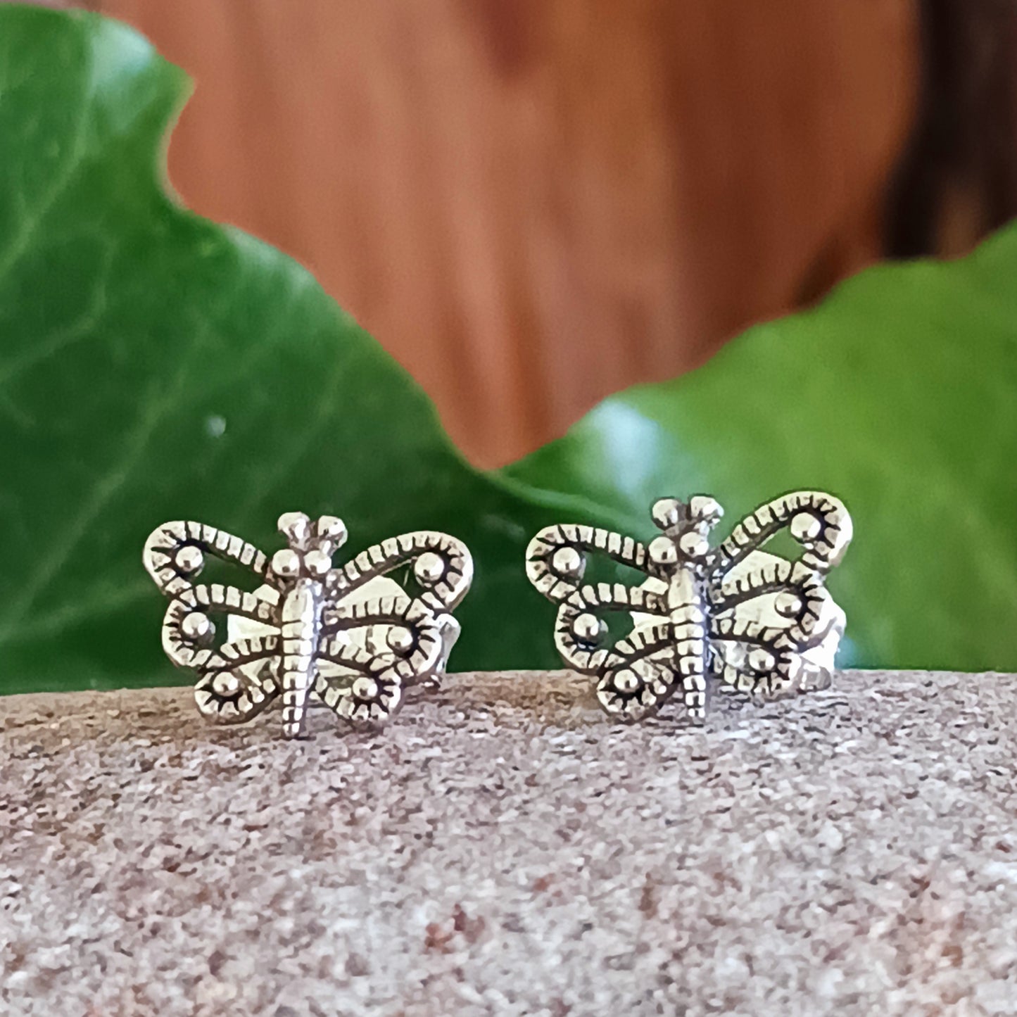 Beautiful and intricate, these Butterfly Ear Studs offer an eye-catching detail to your look. Crafted from 925 Solid Silver, these earrings measure approximately 9 x 6 mm and come with an ethical recycled pouch for easy storage.