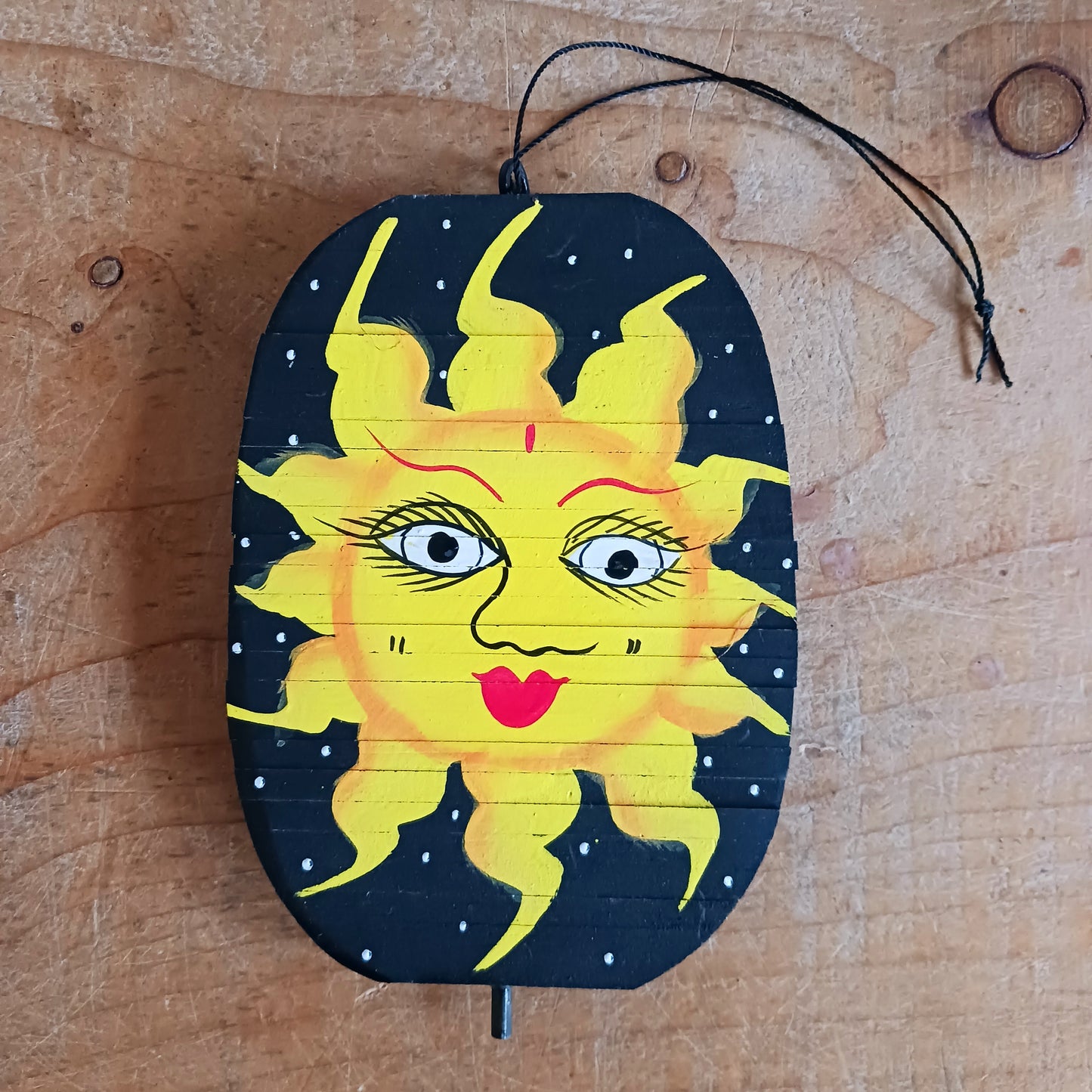 Bring celestial beauty to your space with this stunning Sun & Moon Mobile, handcrafted from sustainable wood for an eco-friendly touch. Designed for both indoor and outdoor use, this unique wind spinner adds movement, colour, and charm to any setting.
