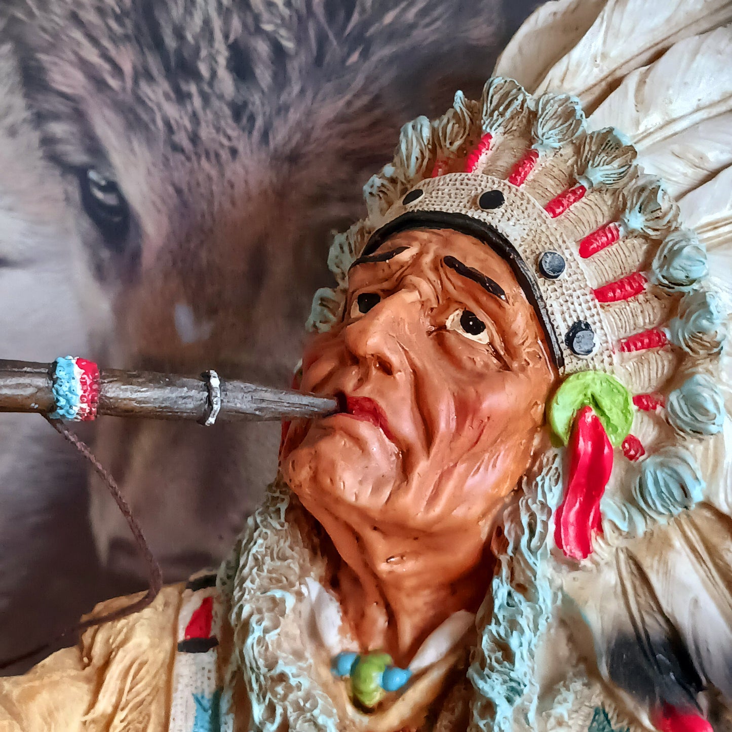 Elevate your space with the serene elegance of this Native American Chief Smoking a Peace Pipe figurine, a captivating symbol of wisdom and cultural harmony. Expertly crafted with intricate detail, this masterpiece depicts a noble chief in traditional tribal attire, smoking a symbolic peace pipe with grace and dignity. From the regal feathered headdress to the delicate carving of the pipe, every element reflects the artistry and cultural depth of Native American traditions.
