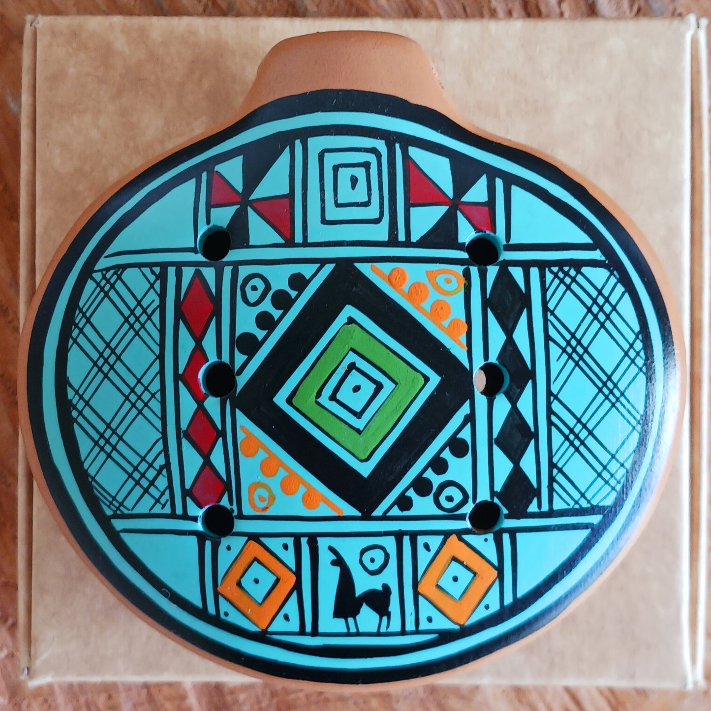 Experience the timeless sound of ancient cultures with these gorgeous ocarinas, handcrafted from fired clay in Peru. Adorned with vibrant, traditional designs, they are a favourite among musicians.