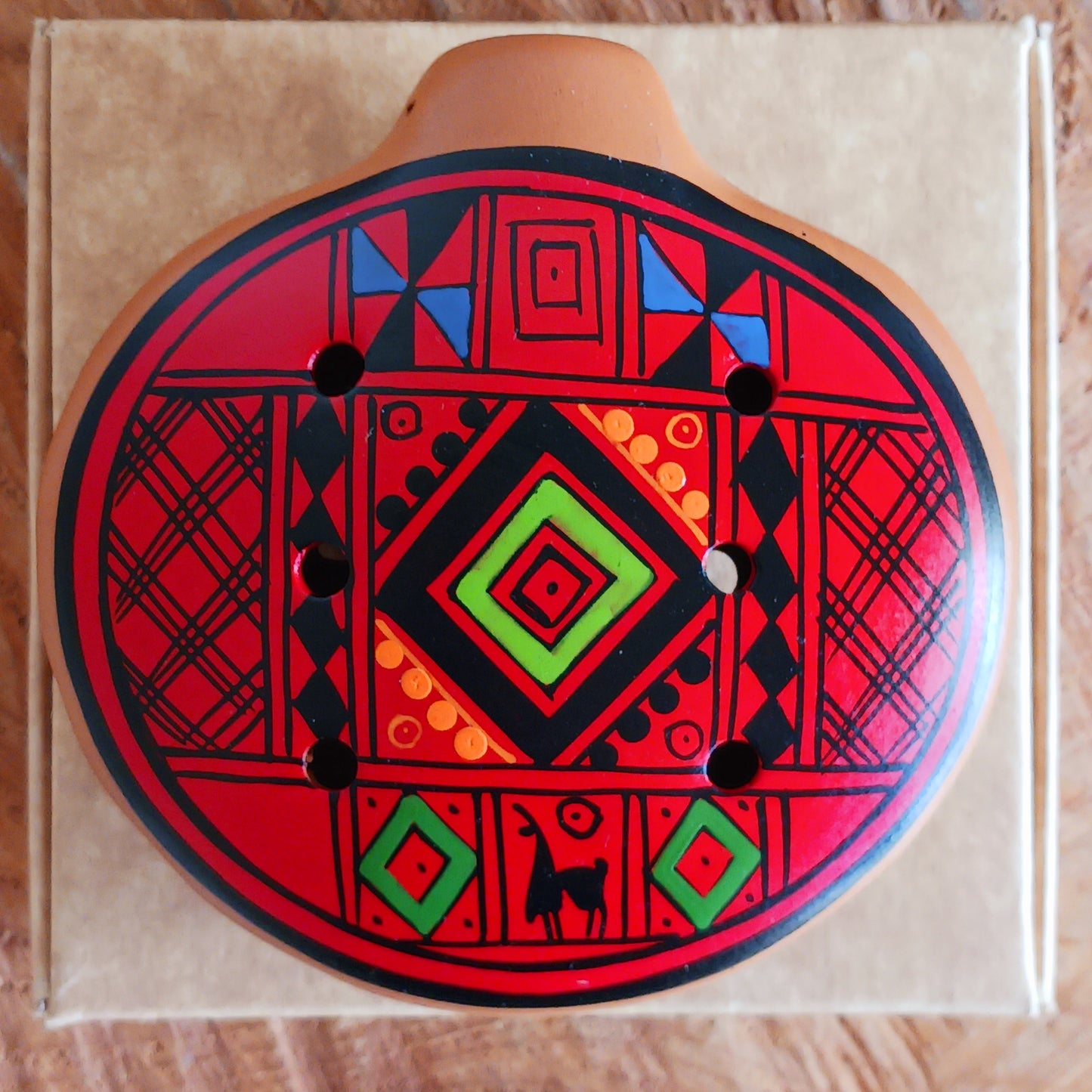 Experience the timeless sound of ancient cultures with these gorgeous ocarinas, handcrafted from fired clay in Peru. Adorned with vibrant, traditional designs, they are a favourite among musicians.