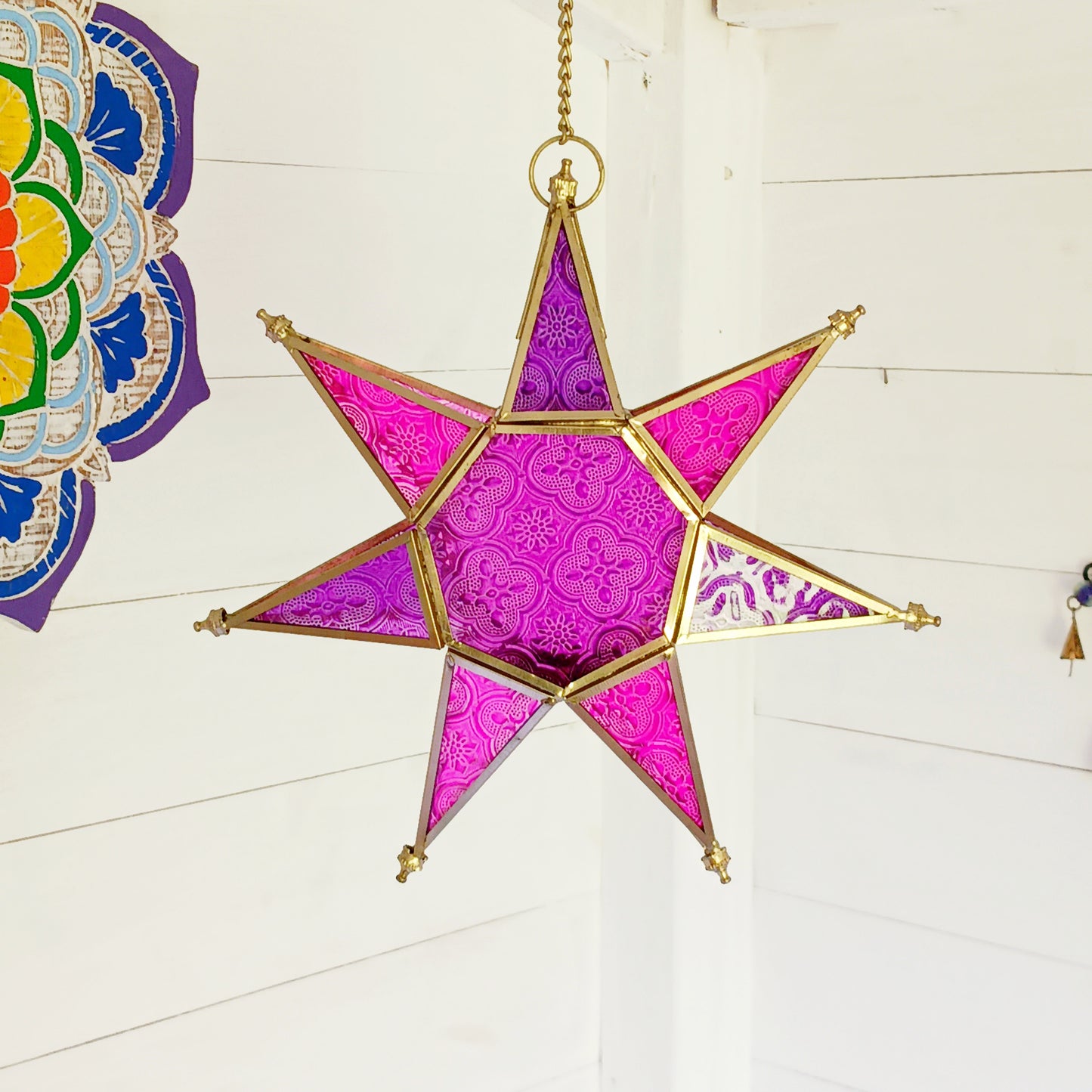 These Moroccan style star glass lanterns are handcrafted by skilled artisans and come in beautiful rich colours that catch the eye and instantly add atmosphere to any room.