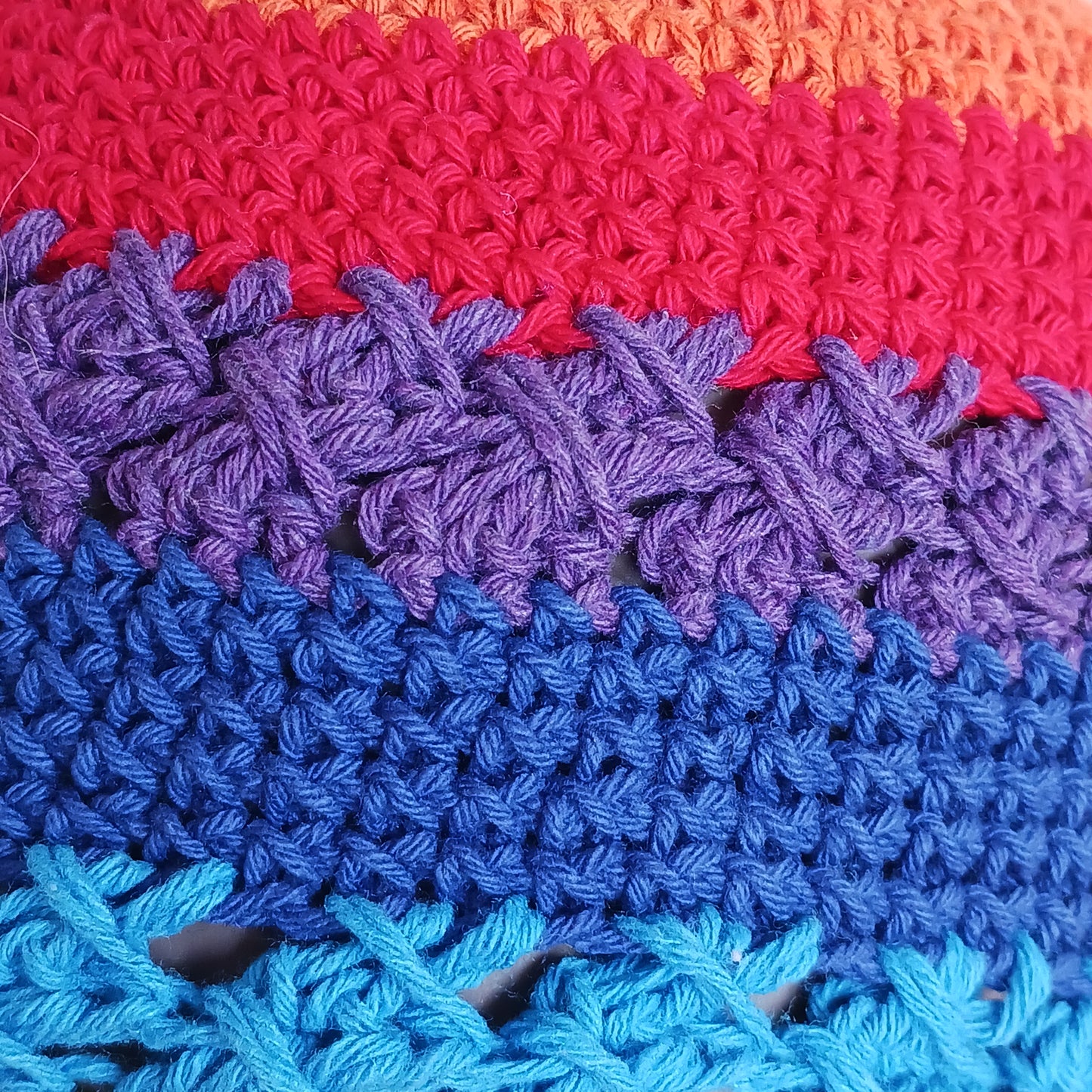 Handmade rainbow crochet sun hat with a flexible brim. Perfect for holidays, beach days & festivals. Unique, lightweight, and ready for sunny adventures!