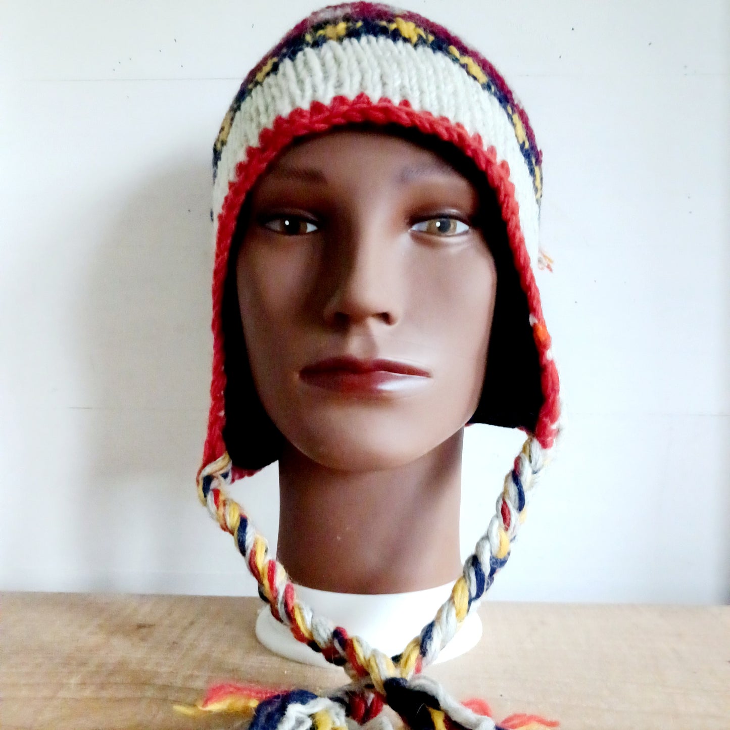 Stay cozy and stylish with our handmade chunky wool earflap hats, crafted in Nepal by skilled women artisans in Kathmandu. Each hat is 100% pure wool and features a soft polar fleece lining for extra warmth and comfort. Perfect for cold winter days, outdoor adventures, or adding a touch of handmade charm to your look.