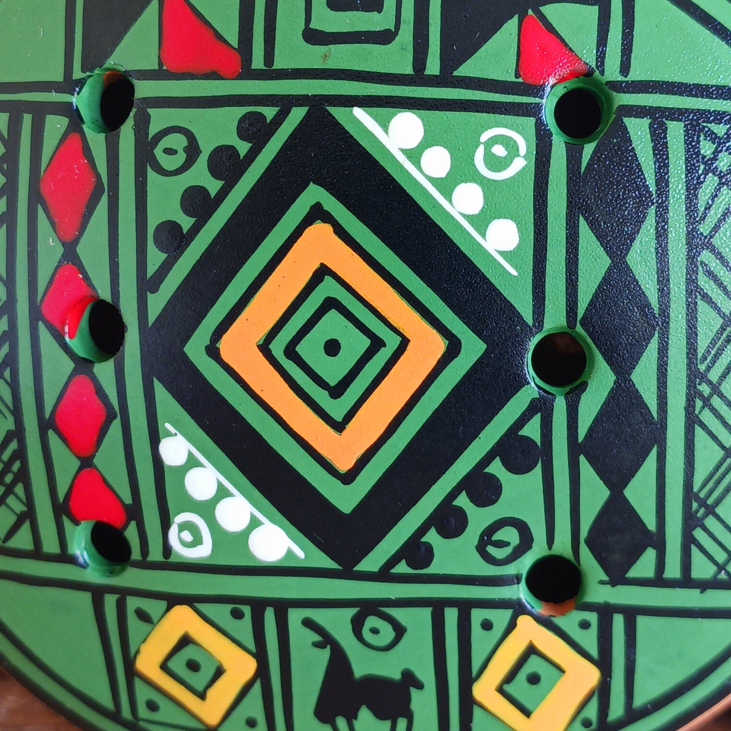 Experience the timeless sound of ancient cultures with these gorgeous ocarinas, handcrafted from fired clay in Peru. Adorned with vibrant, traditional designs, they are a favourite among musicians.