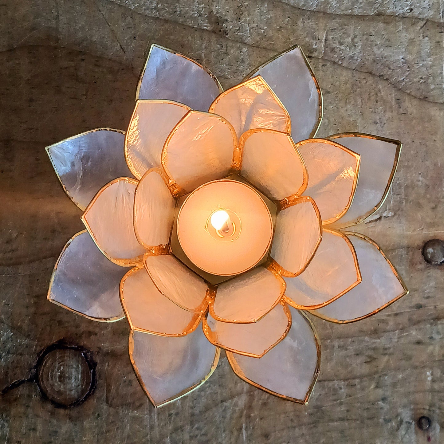 A perfect gift or centerpiece, this lotus candle holder blends mindful design with timeless charm.