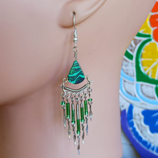 These beautiful hoop earrings incorporate a dark green agate stone with Silver plated hooks. These earrings have been hand made and are presented in a traditionally made pouch, gift wrapped and ready to give☸