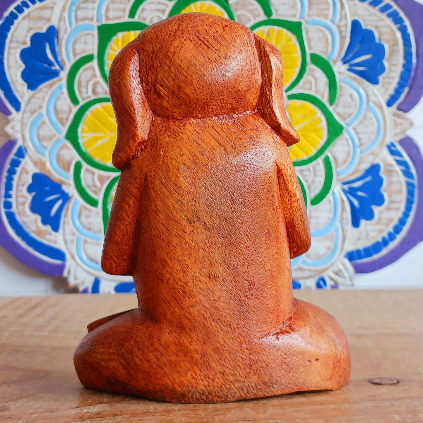 Add a touch of playful serenity to your space with this Meditating Dog Woodcarving. With its paws pressed together in prayer and eyes gently closed, this charming figure radiates calm and quiet joy. Perfect for yoga studios, meditation corners, or any space that could use a little extra soul, it brings a relaxed, earthy energy into your home.