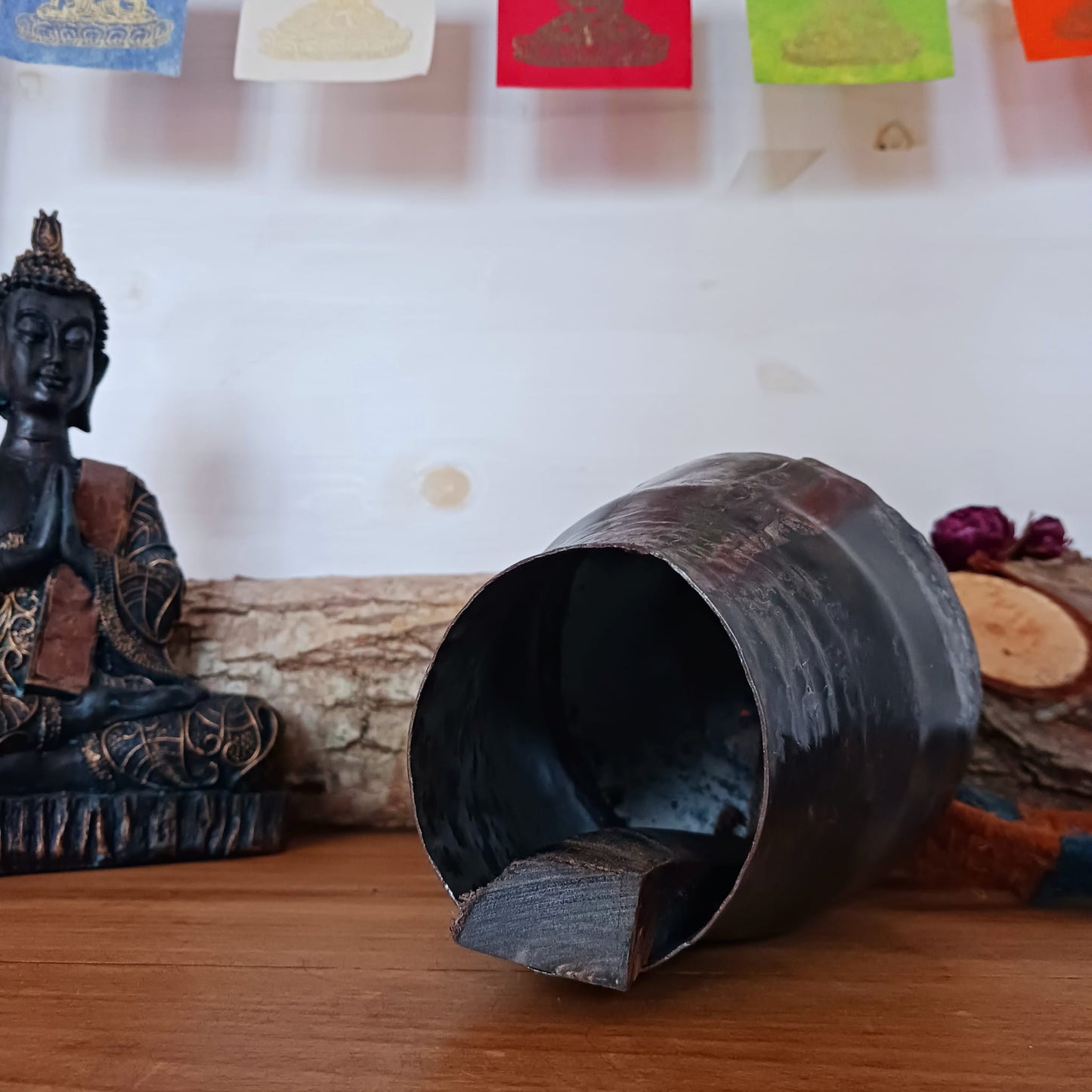 These traditionally designed large size yak bells come with a strong woolen neck strap for hanging. Traditionally these bells are hung around the necks of yaks in Nepal and Tibet so the animals can be located. Nowadays people use them as windchimes as well. The bell produces a wonderfully unique deep and clear sound.