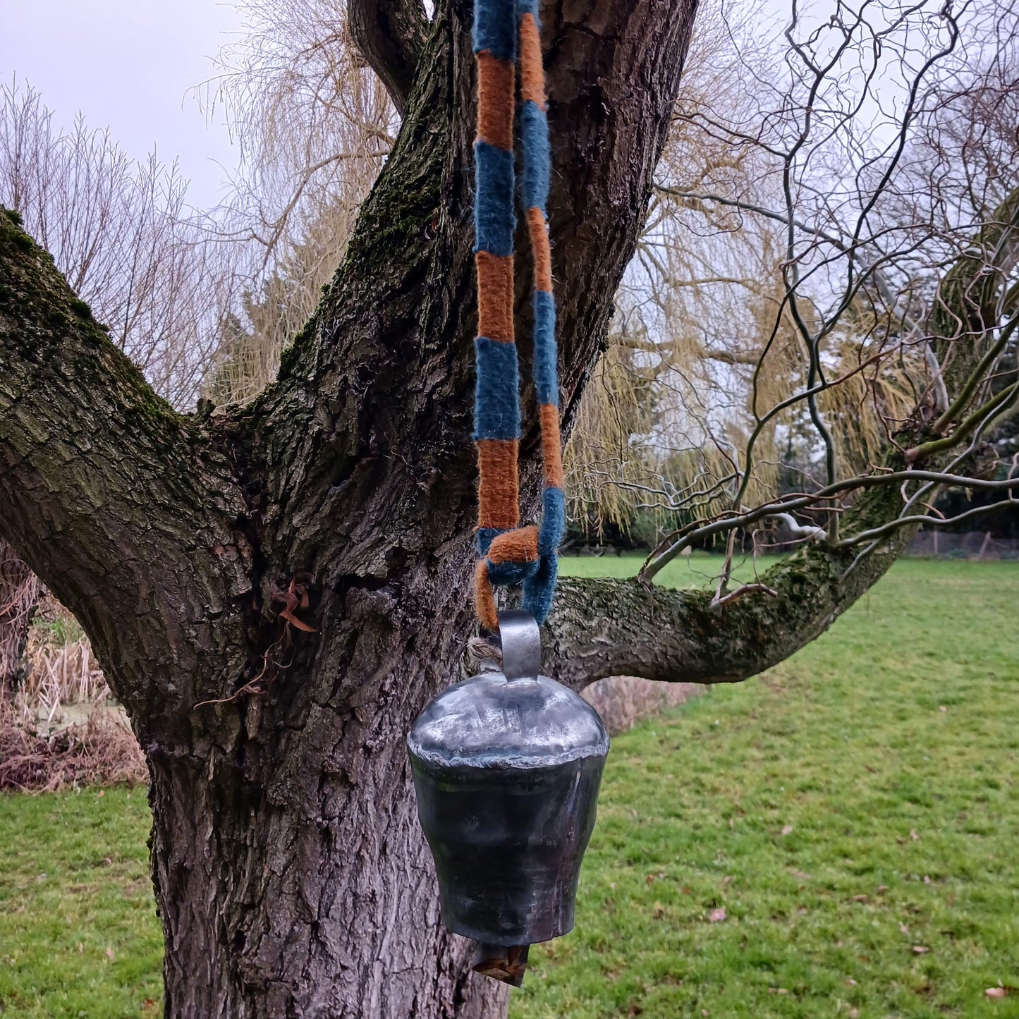 These traditionally designed large size yak bells come with a strong woolen neck strap for hanging. Traditionally these bells are hung around the necks of yaks in Nepal and Tibet so the animals can be located. Nowadays people use them as wind chimes as well. The bell produces a wonderfully unique deep and clear sound.