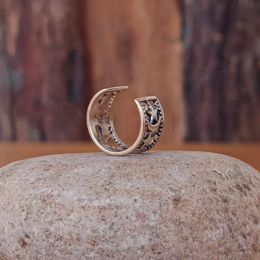 This beautiful Moon and Star Ear Cuff is designed to be worn, cuffed around the ear. A stunning night sky meets a twinkling star with moon on this silver vintage Ear Cuff.