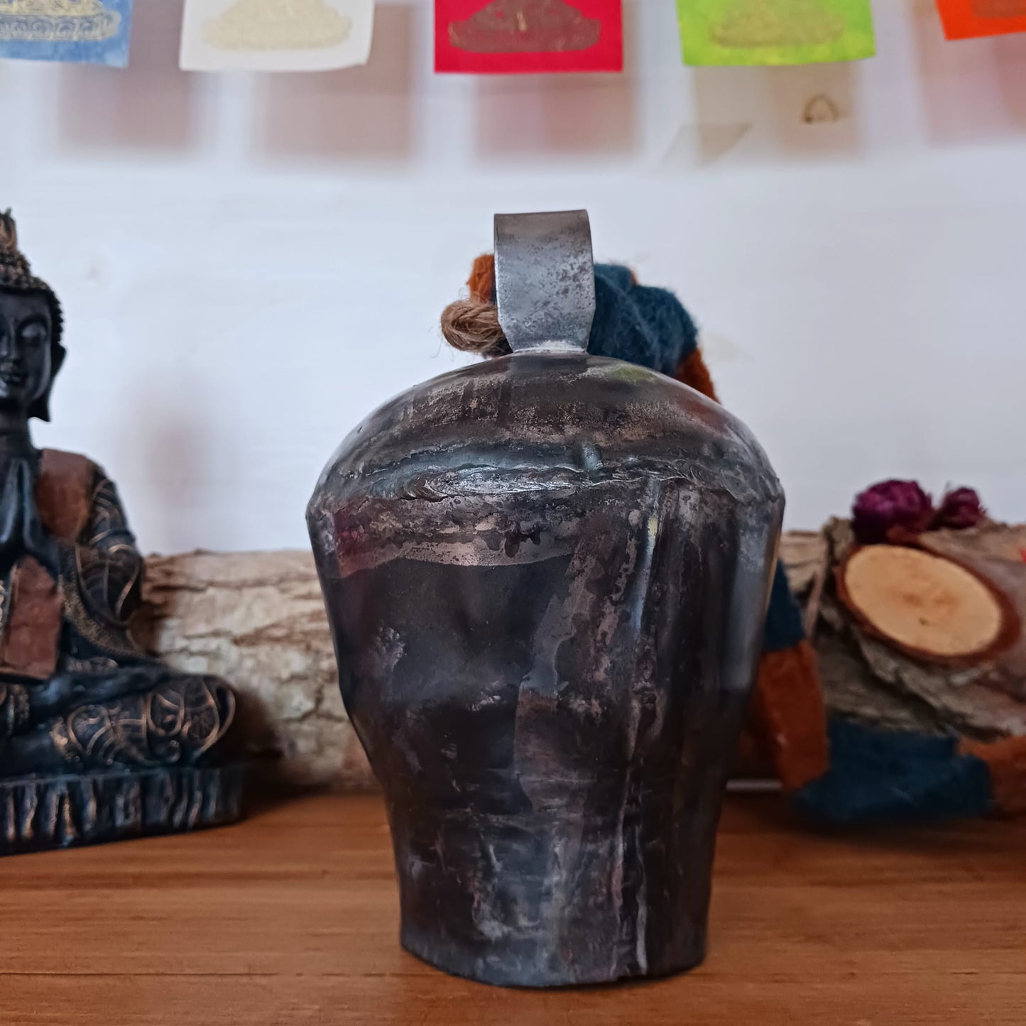These traditionally designed large size yak bells come with a strong woolen neck strap for hanging. Traditionally these bells are hung around the necks of yaks in Nepal and Tibet so the animals can be located. Nowadays people use them as windchimes as well. The bell produces a wonderfully unique deep and clear sound.