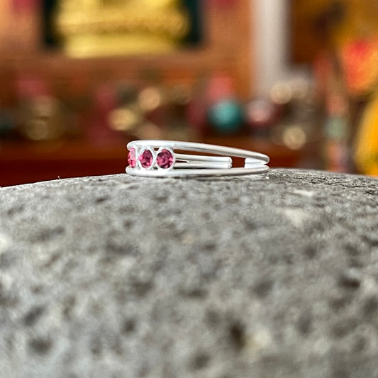 925 Sterling silver toe ring with three pretty red rose stones. Add a little bit of silver to your toes with our solid 925 stamped solid silver toe ring, beautifully presented in a little fabric drawstring pouch made from off cuts from sari materials that would have otherwise been discarded.