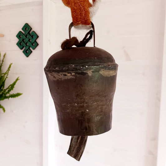 These traditionally designed large size yak bells come with a strong woolen neck strap for hanging. Traditionally these bells are hung around the necks of yaks in Nepal and Tibet so the animals can be located. Nowadays people use them as windchimes as well. The bell produces a wonderfully unique deep and clear sound.
