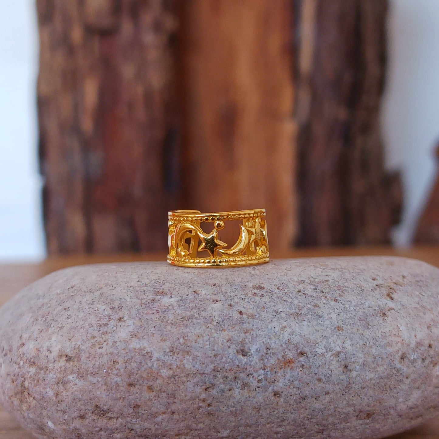 Beautiful and dainty Moon & Stars gold plated ear cuff. No piercing is needed to wear, it can be easily adjusted to hug your ear cartilage. Perfect for anyone who doesn't have pierced ears or if you just want to add to your boho look.