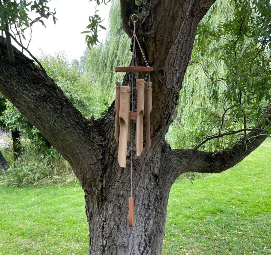This lovely natural bamboo windchime makes a wonderful decorative item for your garden. The six cut bamboo chimes make a lovely soft sound when the wind blows.