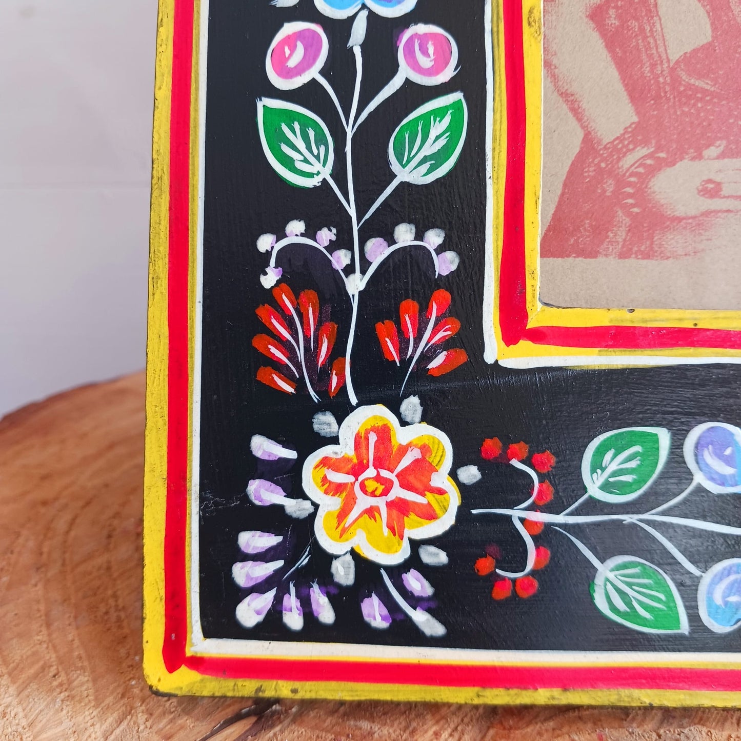 These lovely handmade wooden photo frames are made from sustainable mango wood and hand painted with floral designs. Each is decorated with vibrant flower designs in a beautiful tapestry of colour. This is impressive Indian artistry, ideal for displaying your favorite prints. Each is unique and perfect for gifting.