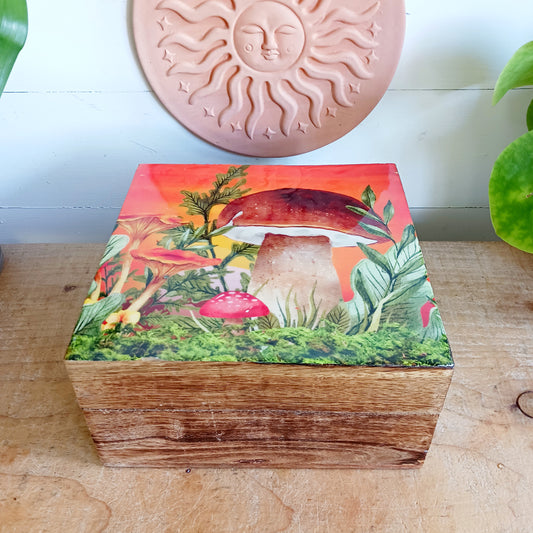 Add a touch of woodland charm to your home with this Wooden Mushroom Square Box, featuring a playful mushroom design. Combining practical storage with whimsical style, this decorative wooden box is perfect for keeping jewellery, trinkets and other small treasures safely tucked away.