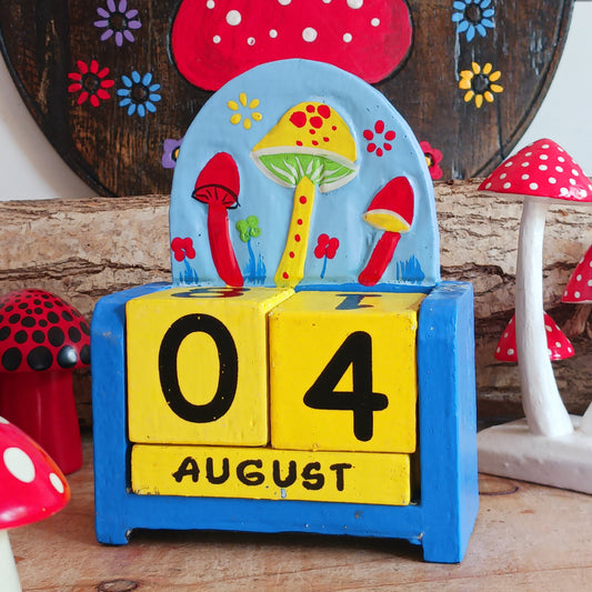 This fun, hand painted wooden Mushroom calendar is perfect for your work or study space and makes a great desk-buddy too!&nbsp; Simply rotate the wooden blocks each day and use year after year.